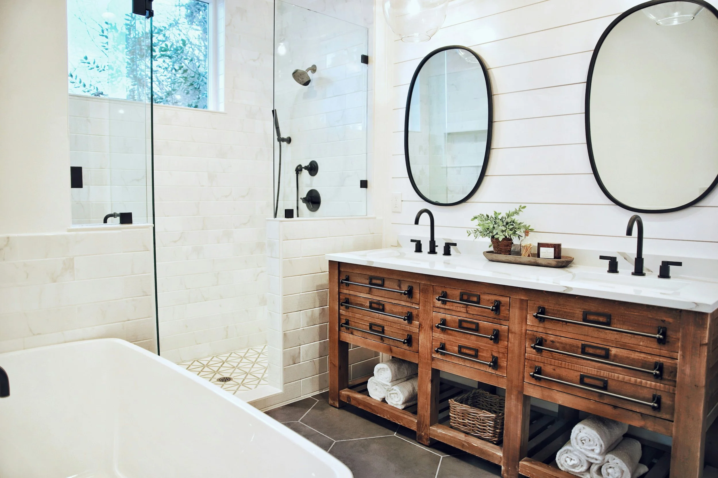 Modern bathroom walk-in shower with glass enclosure